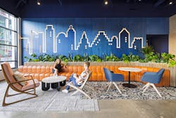 Inspired by an Atlassian employee&rsquo;s Austin City Limits sign, the Mithun team created an Austin skyline with LED strip lighting for the ground-floor coffee shop.