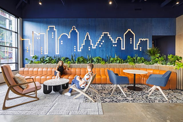 Inspired by an Atlassian employee&rsquo;s Austin City Limits sign, the Mithun team created an Austin skyline with LED strip lighting for the ground-floor coffee shop.