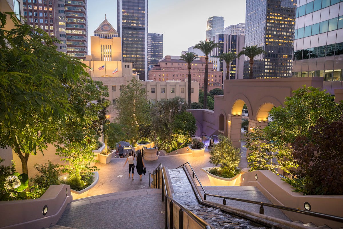 Bunker Hill Steps, Los Angeles. Accent lighting highlights new layers of landscape and planter features while complementing the existing urban environment, which is positioned low at the ground plane.
