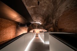 Glowing walkway: The self-supporting steel walkway, designed by Stefano Boeri Architetti, descends through a dark, vaulted gallery and ends in the spectacular Octagon Room.