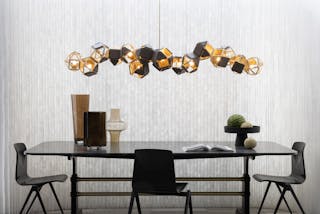 Welles Long Chandelier 16, in satin brass and sparrow brown leather, by Sybille de Margerie for Gabriel Scott