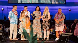 Dirk and Shelley Wald (back row, second and third from left), accept the 2023 Rick Wiedemer Guiding Light Award at The H Foundation&apos;s annual 2023 Goombay Bash fundraiser.