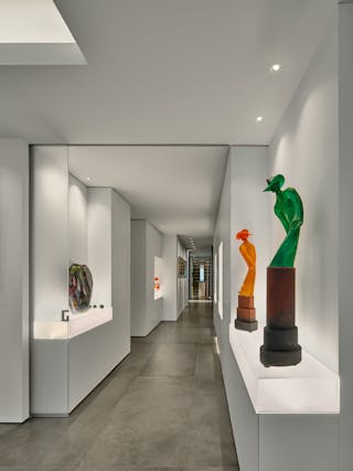Flexible lighting within niches accommodates many types of sculptures.