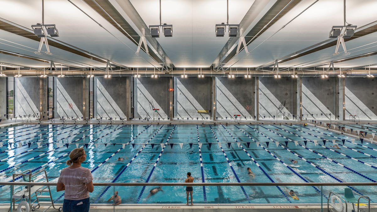 View south toward the interior face of the concrete fin walls, Eastside Recreation Center natatorium, in El Paso, Texas, designed by Perkins&amp;Will