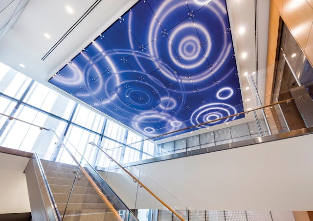 LED fixtures on metal plates are connected to a DMX controller to produce an animated water effect in the MART lobby.